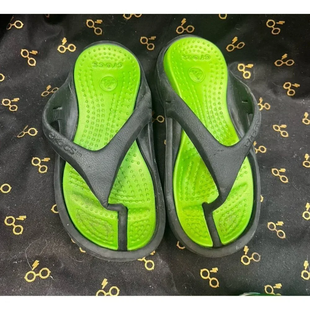 Crocs size 10 11 green and black flip flop sandals